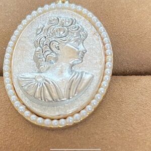 Elegant Silver Cameo Medallion